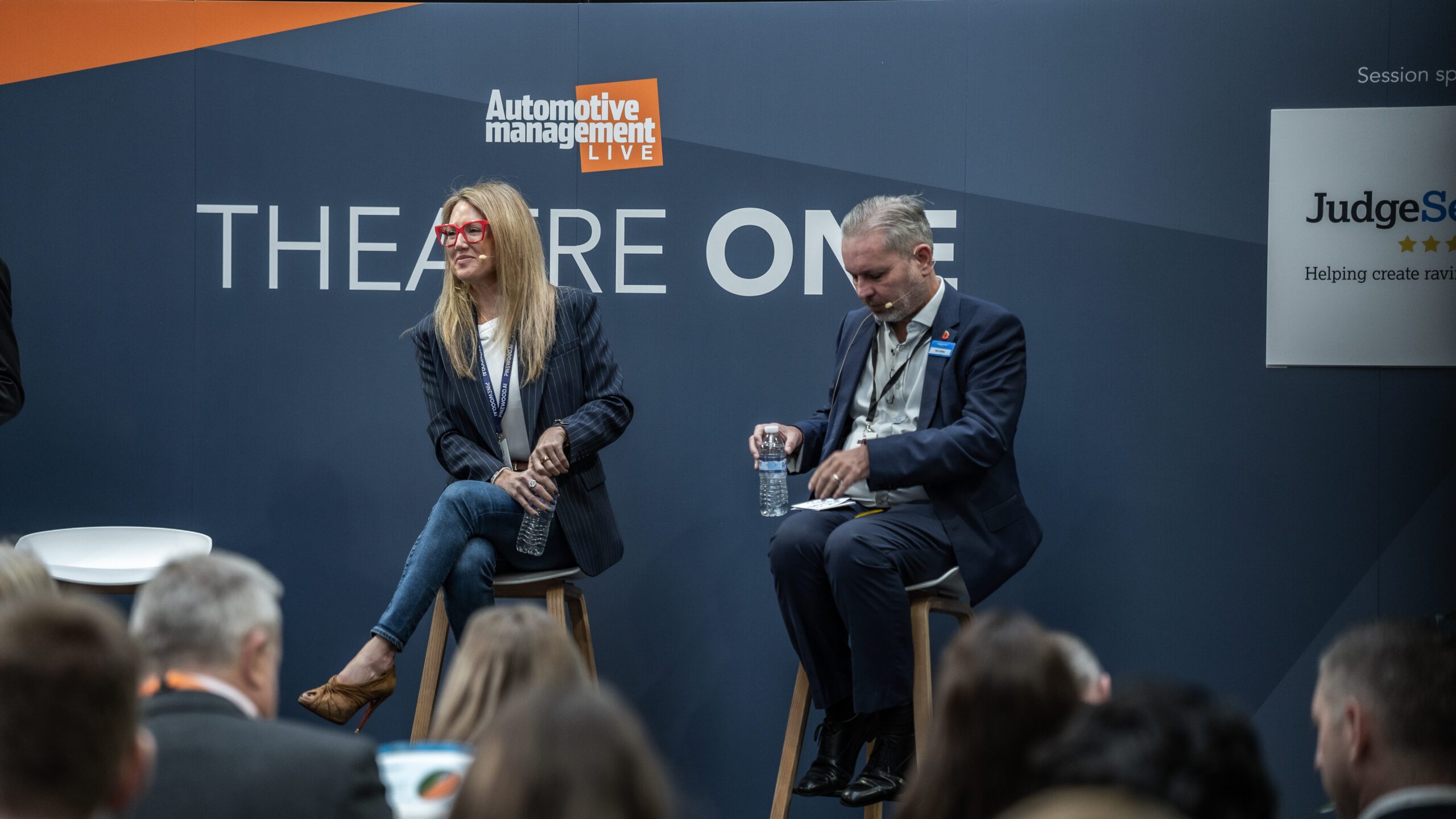 Kim Costello the Pinewood.AI Chief Marketing Officer talking on stage at AM Live 2024